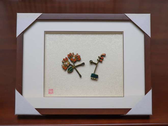 “盘扣+剪纸+民乐”跨界组合 绽放指尖上的非遗魅力